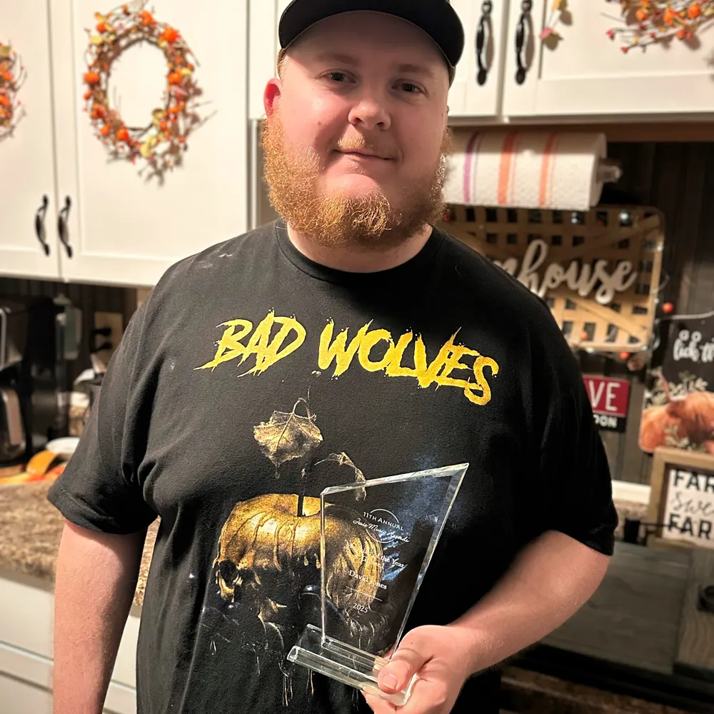 David Jones holding his Josie Music Awards trophy